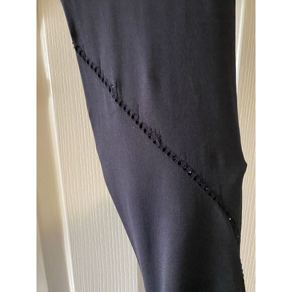 Used gently black Fabletics leggings, cut-out holes design. Seamless! - Picture 3 of 4